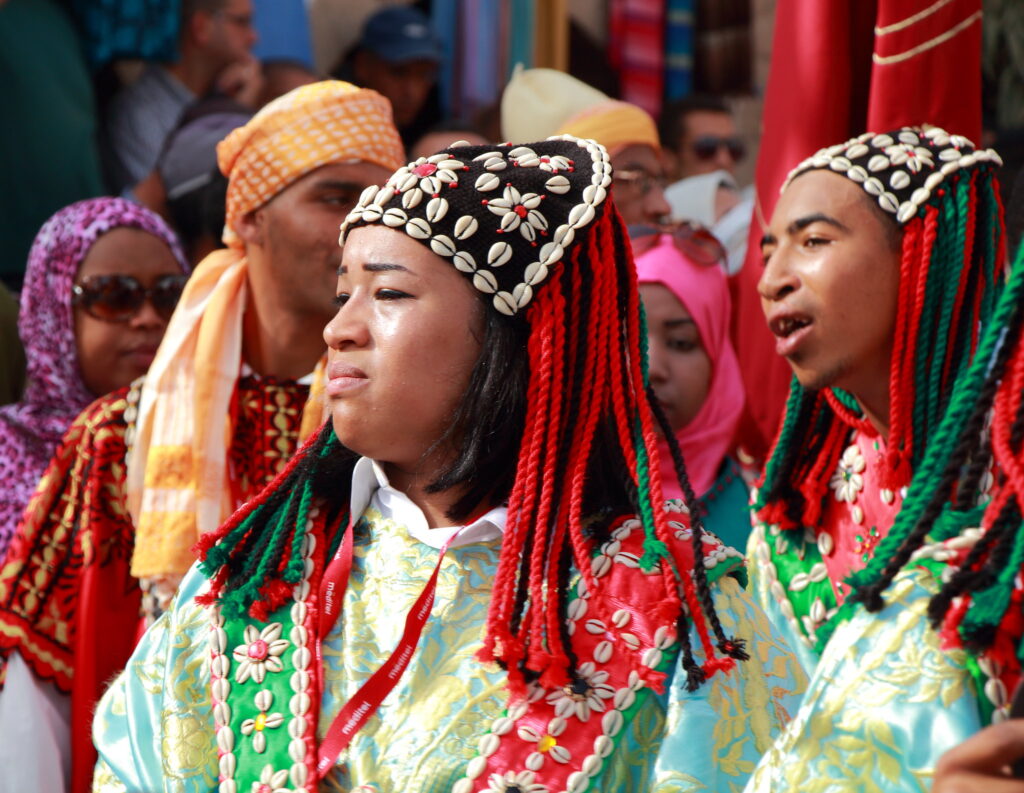 Women playing Gnaoua music in a festival