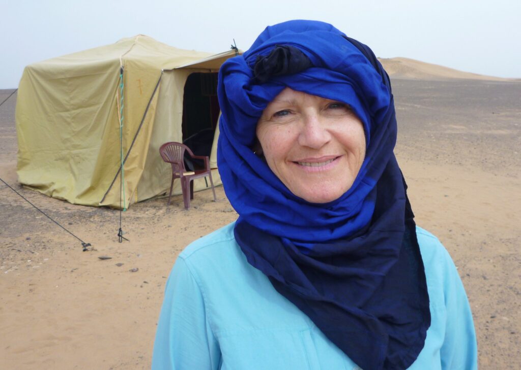 Backpacking experience in Morocco, a woman covering her face