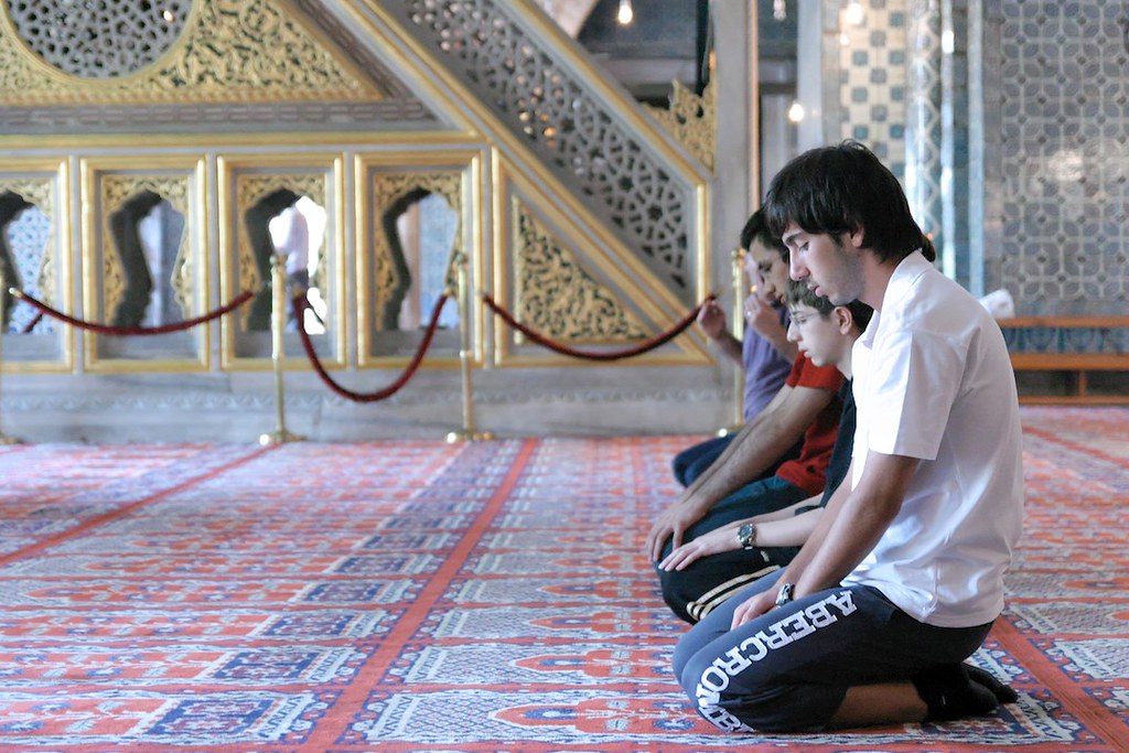 Muslim people praying during Ramadan