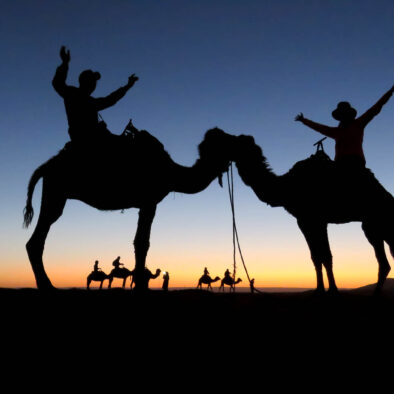 riding camels in Merzouga and spending the night in the camp