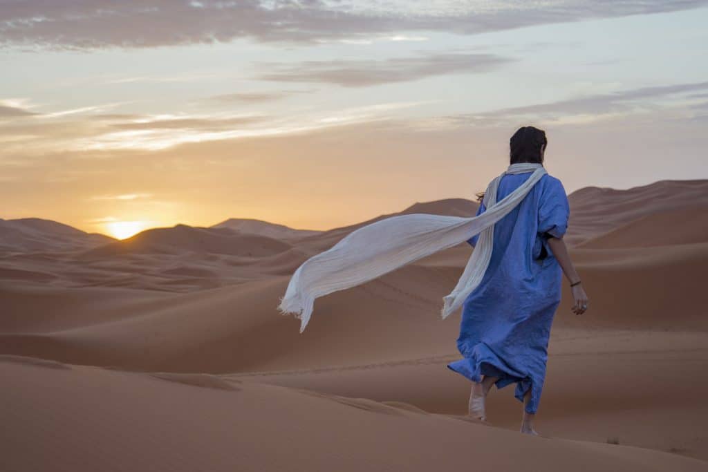 Berber Man backpacking in the desert of Morocco