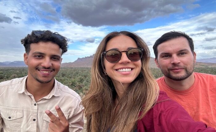 2 clients with our driver during our Marrakech to Zagora desert tour 2 days